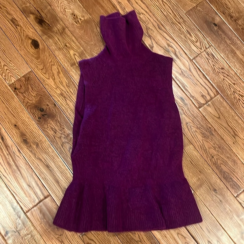 NWT!  White House Black Market peplum turtle neck top in a deep purple.